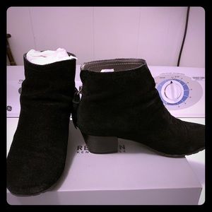 Black zipper tassel booties